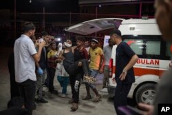Palestinians wounded in Israeli bombardment of the Gaza Strip are brought to a hospital in Khan Younis, June. 27, 2024.