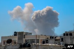 Smoke billows after Israeli bombardment in the vicinity of the Shifa Hospital in Gaza City, March 23, 2024, amid battles between Israel and the militant group Hamas.