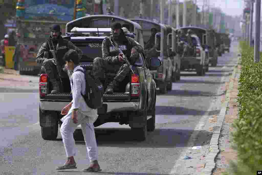 Paramilitary troops patrol after an angry Muslim mob attacked a Christian area in Pakistan on Aug. 17, 2023.