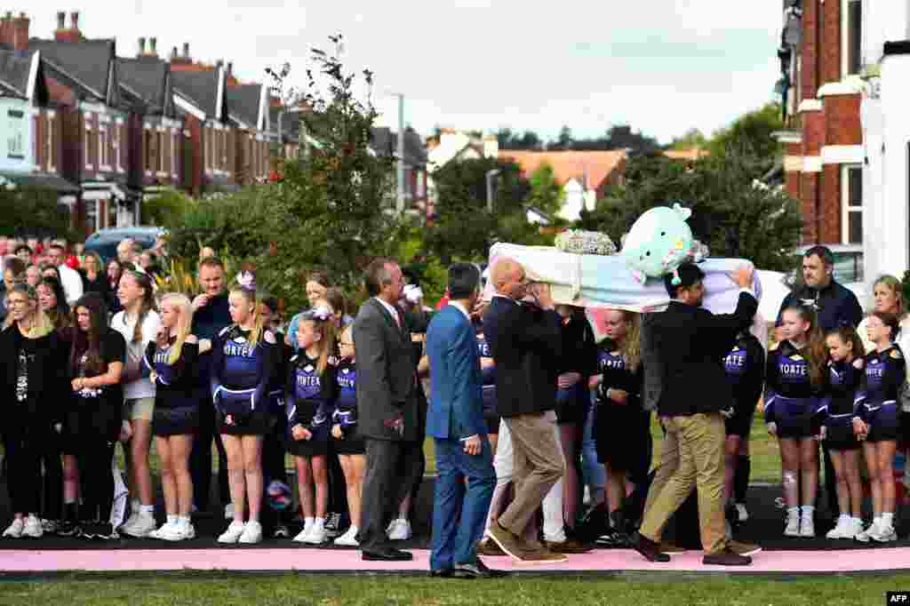 The coffin of Southport stabbing victim Elsie Dot Stancombe, 7 years old, arrives for the funeral at the St John's Church, in Birkdale, near Southport, north western England. Stancombe was among the three girls murdered during the July 29 knife attack at a Taylor Swift-themed dance party.