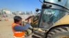 Turkish Bulldozer Operator Prays for Bodies So Families Can Find and Bury Their Dead 