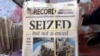 Kansas newspaper publisher files lawsuit over police raid