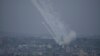 Roket ditembakkan ke arah Israel dari Jalur Gaza pada Senin, 9 Oktober 2023. (AP Photo/Hatem Moussa)