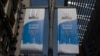 FILE - Banners promoting a BRICS summit hang from a pole outside the Sandton Convention Centre in Johannesburg, South Africa, Aug. 19, 2023. 