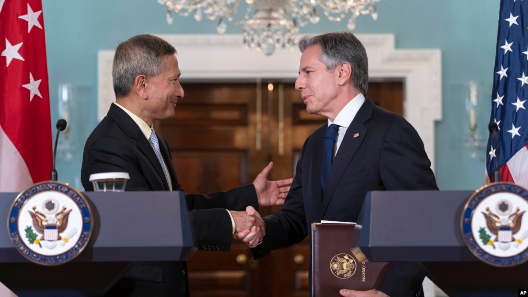 Secretary of State Antony Blinken, right, shakes hands with Singapore's Foreign Minister Vivian Balakrishnan, after a news conference at the State Department, Friday, June 16, 2023, in Washington. (AP Photo/Jacquelyn Martin)
