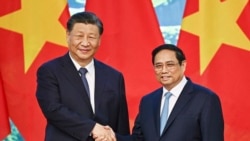 中國國家主席習近平與越南總理阮晉勇在河內舉行會晤。 （美聯社2023年12月13日）