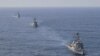Yulgokyi, kapal perusak milik AL Korea Selatan, USS Benfold milik AL AS, dan kapal Atago milik Jepang saat mengikuti latihan pertahanan Angkatan Laut di perairan internasional antara Jepang dan Korea, 17 April 2023. (Foto: Kementerian Pertahanan Korea Selatan via Reuters)