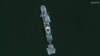 This image released by Maxar Technologies shows the USNS Roy P. Benavidez at the new pier off Gaza, May 18, 2024. (Satellite image ©2024 Maxar Technologies via AP)