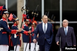 Russia's Foreign Minister Sergey Lavrov leaves after a meeting with Brazil's Foreign Minister Mauro Vieira in Brasilia, Brazil, April 17, 2023.