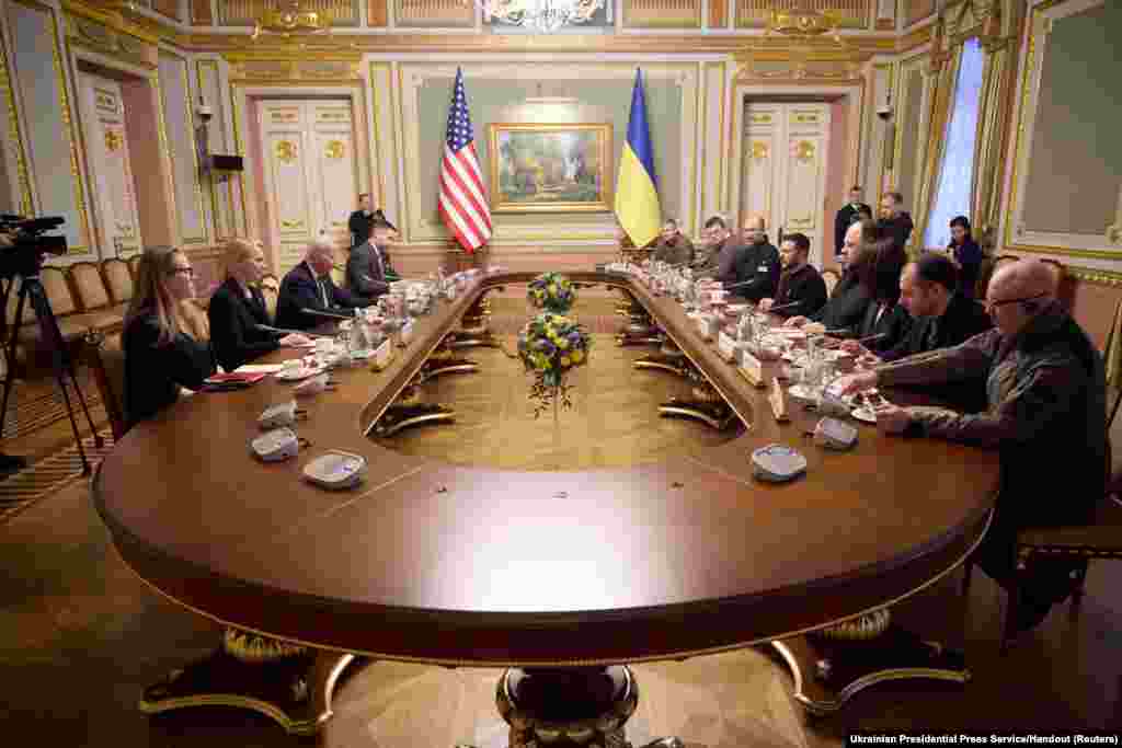 Ukraine's President Volodymyr Zelenskiy and U.S. President Joe Biden attend a meeting in Kyiv, Feb. 20, 2023, amid Russia's attack on Ukraine.