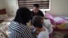 Malbata Duhokî ya ji Almanya Dersînorkirî, Banga Alîkarîyê Dike