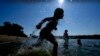 Wild week of US weather includes heat wave, tropical storm, landslide, flash flood and snow