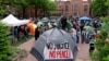 George Washington University students set tents in the campus during a pro-Palestinian protest against the Israel-Hamas war, April 25, 2024, in Washington.