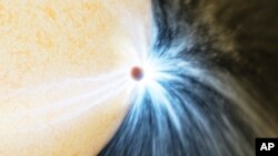 资料照片：加州理工学院/红外分析处理中心(Caltech/IPAC)提供的行星掠过恒星表面的图示。