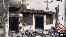 A burnt church is seen on the outskirts of Faisalabad, Pakistan, Aug. 16, 2023, following an attack by Muslim men after a Christian family was accused of blasphemy. 