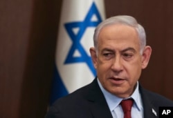 Israeli Prime Minister Benjamin Netanyahu attends the weekly cabinet meeting at the Prime Minister's office in Jerusalem, Dec. 10, 2023.
