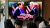 A TV screen shows an image of US President Joe Biden and South Korean President Yoon Suk Yeol in Washington, during a news program at the Seoul Railway Station in Seoul, South Korea, April 27, 2023. 