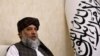 Taliban's acting commerce minister Haji Nooruddin Azizi speaks during an interview with Reuters, at the Embassy of Afghanistan in Beijing, China, Oct. 19, 2023. 