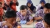 FILE - Simulasi Makan Siang Gratis di SMPN 2 Curug, Tangerang. (Sumber: ekon.go.id)
