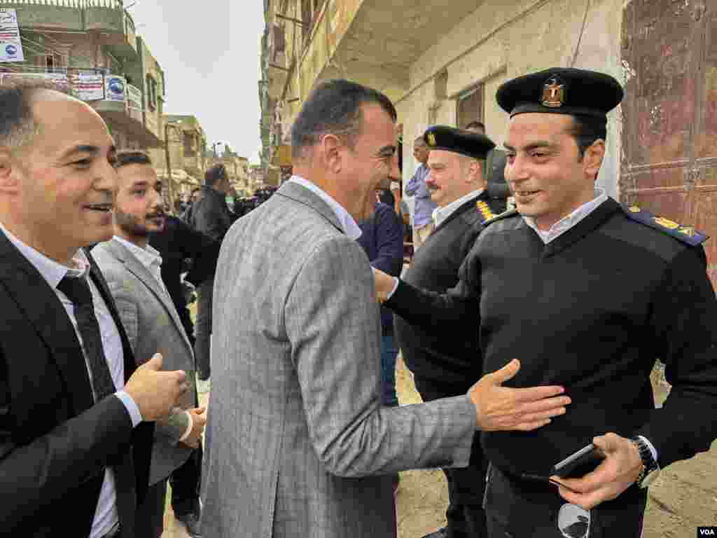 Sissi-aligned lawmaker Aziz Matar visits a poll in his district of North Sinai, the site of the Egyptian army’s decade-long fight against a local ISIS affiliate, an effort that has resulted in thousands of home evictions and demolitions. Arish, Egypt, Dec. 10, 2023. (Hamada Elrasam/VOA)