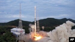 资料照：朝鲜官方公布2023年5月31日发射火箭的照片。