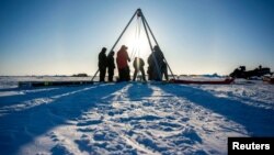 Conducted through the U.S Navy Arctic Submarine Laboratory's biennial Ice Camp, this field test marked IceNode's first in a polar environment. (US NAVY/SCOTT BARNES/Handout via REUTERS)