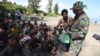 Some of Over 300 Rohingya Refugees on Indonesian Beaches Transferred to Shelter 
