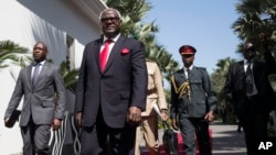 FILE - Ernest Bai Koroma, center, then-president of Sierra Leone, is seen during a visit to Banjul, Gambia, Dec. 13, 2016. Koroma has been charged with treason for his alleged involvement in a failed coup in November, Sierra Leone's government said Jan. 3, 2024.