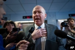 FILE - Boeing CEO Dave Calhoun speaks with reporters at the Capitol in Washington, Jan. 24, 2024.