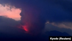 A remote camera image shows an eruption of Sakurajima in Tarumizu, Kumamoto prefecture, western Japan, July 24, 2022.