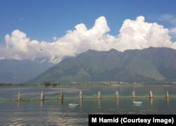 Cloud buildup in summer capital Srinagar, Kashmir, Aug. 19, 2022.