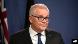 Former Australian Prime Minister Scott Morrison speaks during a news conference in Sydney, Aug. 17, 2022. 