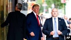 Former President Donald Trump departs Trump Tower, Aug. 10, 2022, in New York, on his way to the New York attorney general's office for a deposition in a civil investigation.