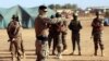 FILE - A French Marine Special Operation Forces officer trains Mali's FAMA soldiers, December 15, 2021. 
