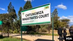 Signage is seen for Chitungwiza Magistrates Court. A magistrate court in Zimbabwe charged editor Wisdom Mdzungairi and reporter Desmond Chingarande with contravening the country's Cyber and Data Protection Act. (Columbus Mavhunga/VOA)
