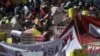 Thousands march through Cape Town in a protest by the powerful COSATU labor body, marking the latest sign of tensions within the ANC-led government, March 7, 2012.