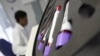 FILE - Blood is tested at the AIDS Care Training and Support Initiative at White River Junction, South Africa. The center has received funds from the President's Emergency Plan for AIDS Relief (PEPFAR).