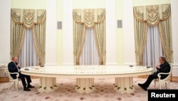 Russian President Vladimir Putin attends a meeting with U.N. Secretary-General Antonio Guterres in Moscow, Russia, April 26, 2022. (Sputnik/Vladimir Astapkovich/Kremlin via Reuters)