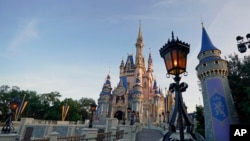 FILE - The Cinderella Castle at the Magic Kingdom at Walt Disney World celebrated the 50th anniversary of the theme park Aug. 30, 2021, in Lake Buena Vista, Fla.
