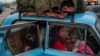 Internally displaced people from Mariupol and nearby towns fleeing from the Russian attacks, arrive at a refugee center , in Zaporizhzhia, Ukraine, April 21, 2022.
