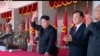 FILE - In an image made from video, North Korean leader Kim Jong Un, center, and Liu Yunshan, China's Communist Party's No. 5 leader, second right, waves during a ceremony to mark the 70th anniversary of the country's ruling party, in Pyongyang, Oct. 10, 