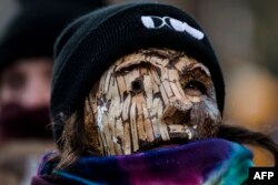 Activists gather at the Place Des Arts after a demonstration against the United Nations Biodiversity Conference (COP15) during the March for Biodiversity for Human Rights in Montreal, Quebec, Canada, Dec. 10, 2022.