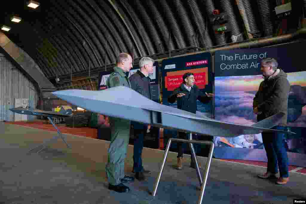 Prime Minister Rishi Sunak during his visit to RAF Coningsby in Linconshire following the announcement that Britain will work to develop next-generation fighter jets with Italy and Japan. The jets, called Tempest in the UK, are to take to the skies by 2035 and serve as a successor to the RAF Typhoon. The ambition is for the planes developed under the global combat air programme (GCAP) to be enhanced by capabilities including uncrewed aircraft, advanced sensors and cutting-edge weapons. December 9, 2022. Joe Giddens/Pool via 