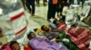 Rohingya refugees receive medical treatment after their arrival at the temporary shelter in Pidie, Aceh province, Indonesia, Dec. 26, 2022.