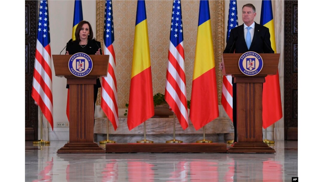 US Vice President Kamala Harris holds a joint press conference following a meeting with Romanian President Klaus Iohannis, right, at Cotroceni Palace in Otopeni, Romania, March 11, 2022.