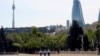 FILE - Police officers patrol in Baku, Azerbaijan, May 18, 2020.
