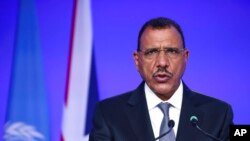 FILE - Niger's President Mohamed Bazoum speaks at the U.N. Climate Change Conference COP26 in Glasgow, Scotland, Nov. 1, 2021. 