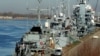 Kapal perang NATO ditambatkan di pelabuhan Riga, Latvia, selama latihan Baltik MCM Squadex 22, 16 Maret 2022. (REUTERS/Ints Kalnins)