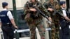 'Man in the Hat' Brussels Bombing Suspect Taken to France to Face Charges
