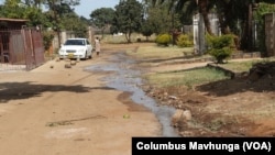 Raw sewage flows into a nearby river in Harare. The government’s Environmental Management Agency is responsible for the prevention of pollution.(Columbus Mavhunga/VOA)